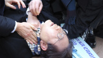 South Korean opposition leader is stabbed in the neck Police say attacker approached for autograph The Associated Press South Korean opposition leader is stabbed in the neck Police say attacker approached for autograph The Associated Press