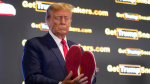 Trump hawks 399 branded shoes at Sneaker Con a day after a 355 million ruling against him  ABC News